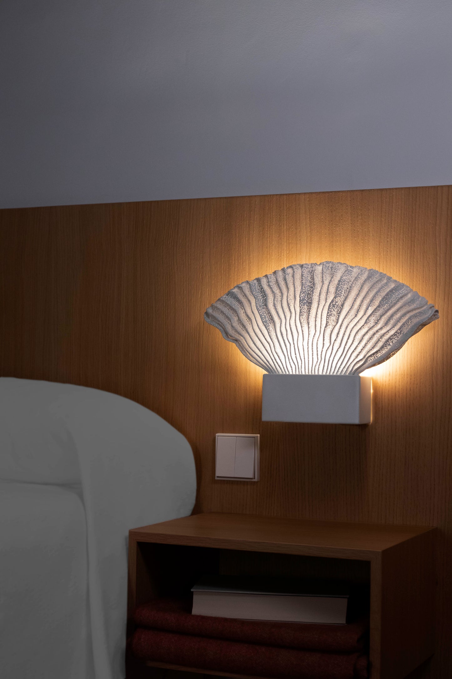 Venus Wall Lamp by A Emotional Light featuring an elegant organic design with warm ambient glow for modern decorative interiors.