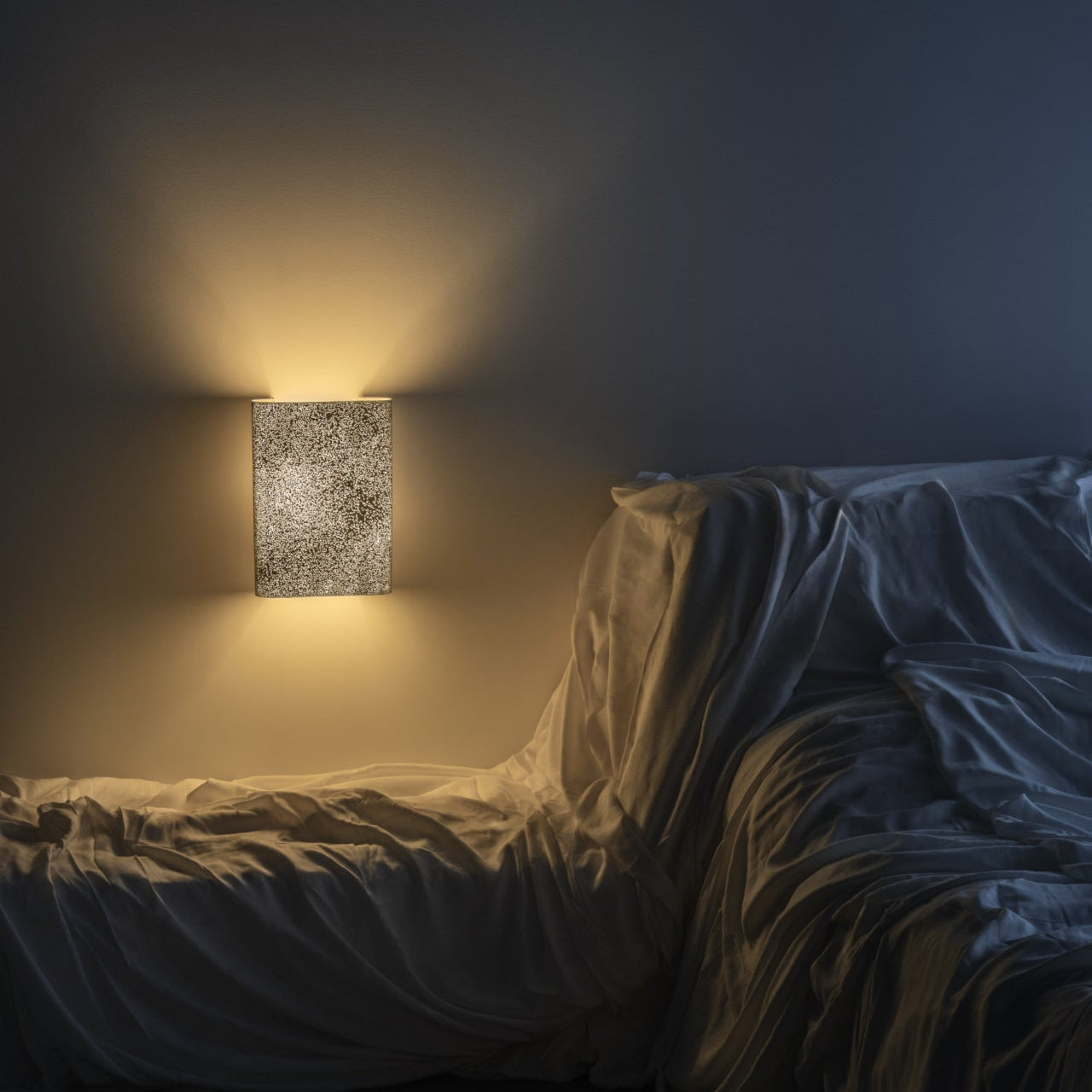 Lisa Wall Lamp by A Emotional Light featuring a sculptural, organic design that casts warm, artistic ambient light on modern walls.