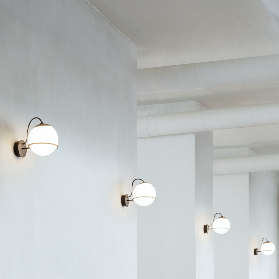 Astep Model 238/1 wall lamp featuring a single 20 cm opaline glass globe held by a refined steel ring on a rectangular backplate for modern elegance.