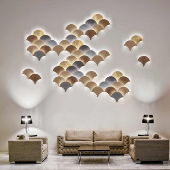 Low-ceiling living room styled with wall uplights, slim ceiling fixtures, creating a taller, airy visual effect.