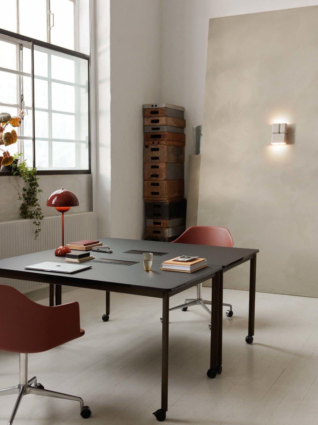Modern home office with ergonomic lighting, soft desk lamp glow, and stylish fixtures for reduced eye strain.