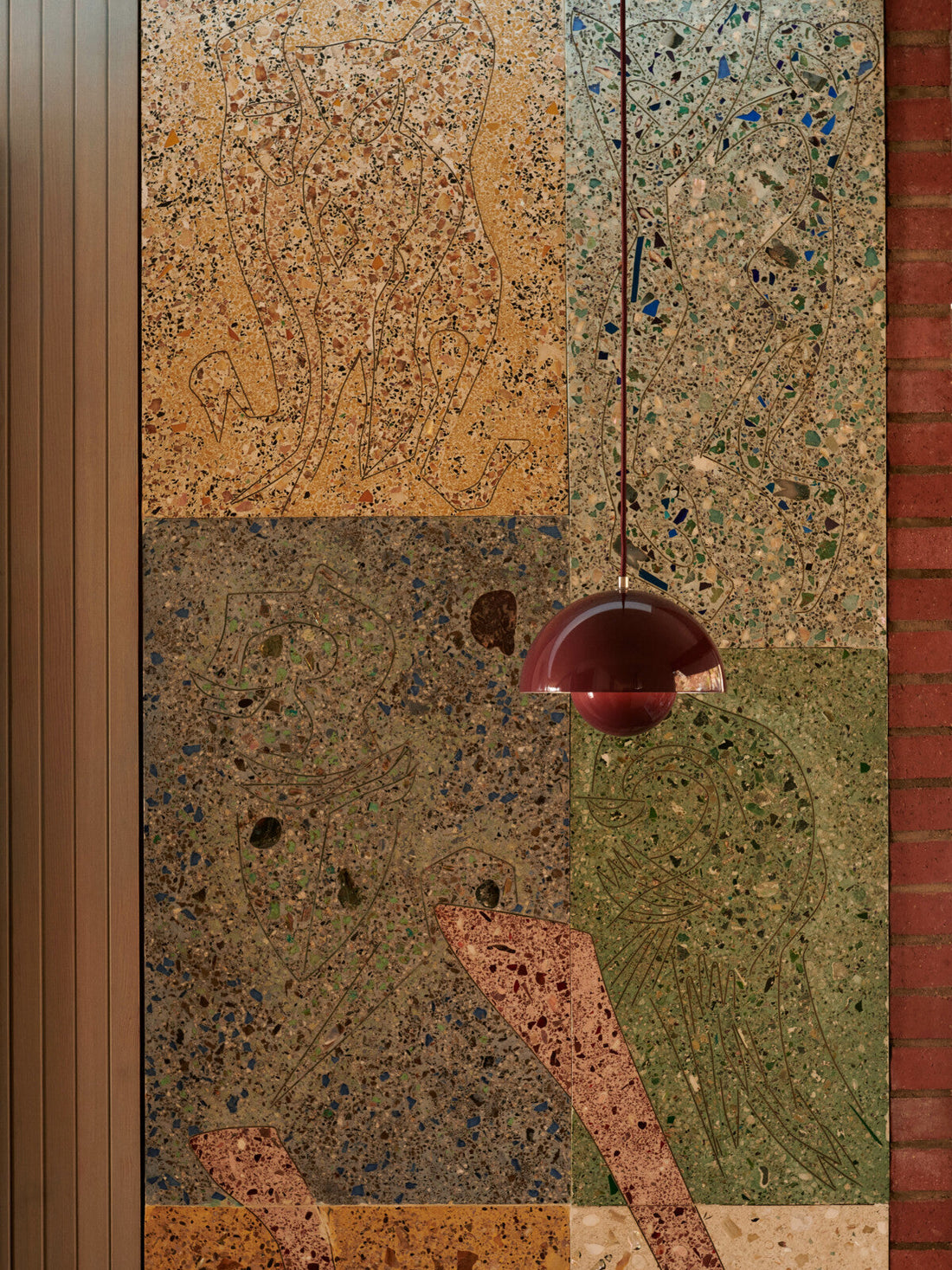 The Flowerpot VP1 pendant by &Tradition suspended in a modern room, offering ambient light.