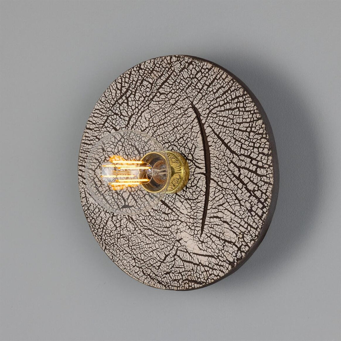 Bog Oak Ceramic Wall Lamp by Mullan Lighting – handcrafted marbled ceramic wall light with brass holder, luxury designer lighting for modern interiors.