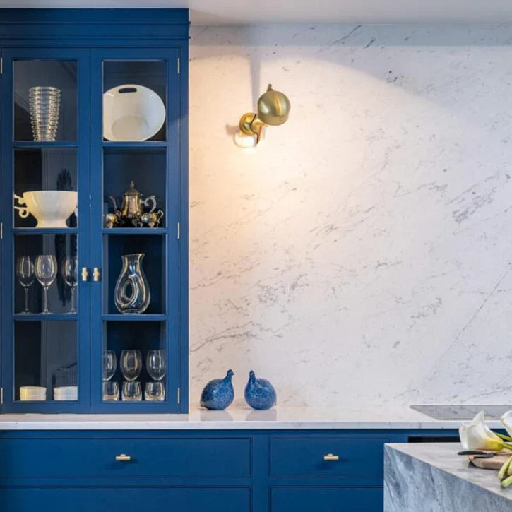 Well-lit pantry and storage area with lighting highlighting shelves for easy access and organization.