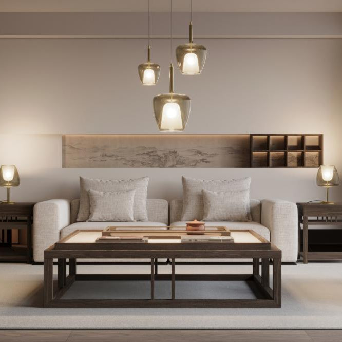 Cozy living room interior with layered lighting using floor lamps, wall lamps, hanging pendants, and warm ambient lighting.