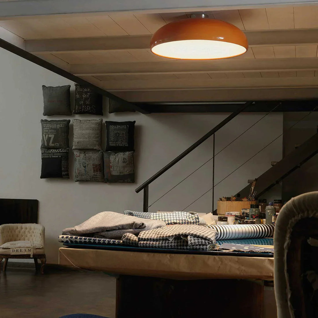 Living room with low ceiling lit by flush mount lights from premium lighting brands in India for a spacious feel.