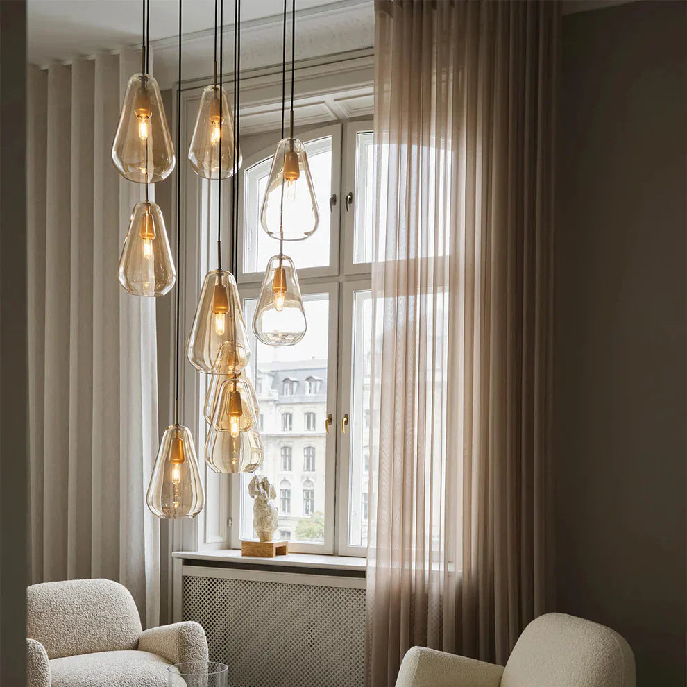 Different types of light sources in lighting design including ambient, task, accent, and decorative lighting with luxury designer fixtures in a modern home interior