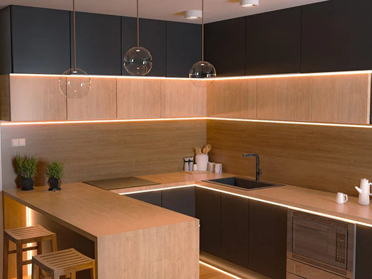 Modern luxury kitchen with warm LED under-cabinet lighting, Scandinavian designer pendants, premium European fixtures, and elegant contemporary cabinetry.