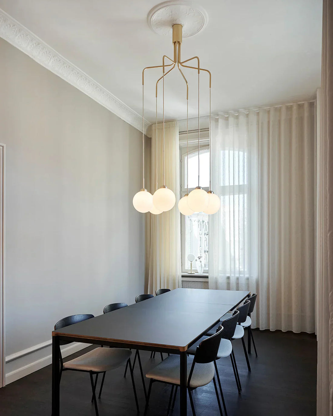 Festively decorated Indian home with hanging pendants, ambient lighting creating an elegant celebration atmosphere.