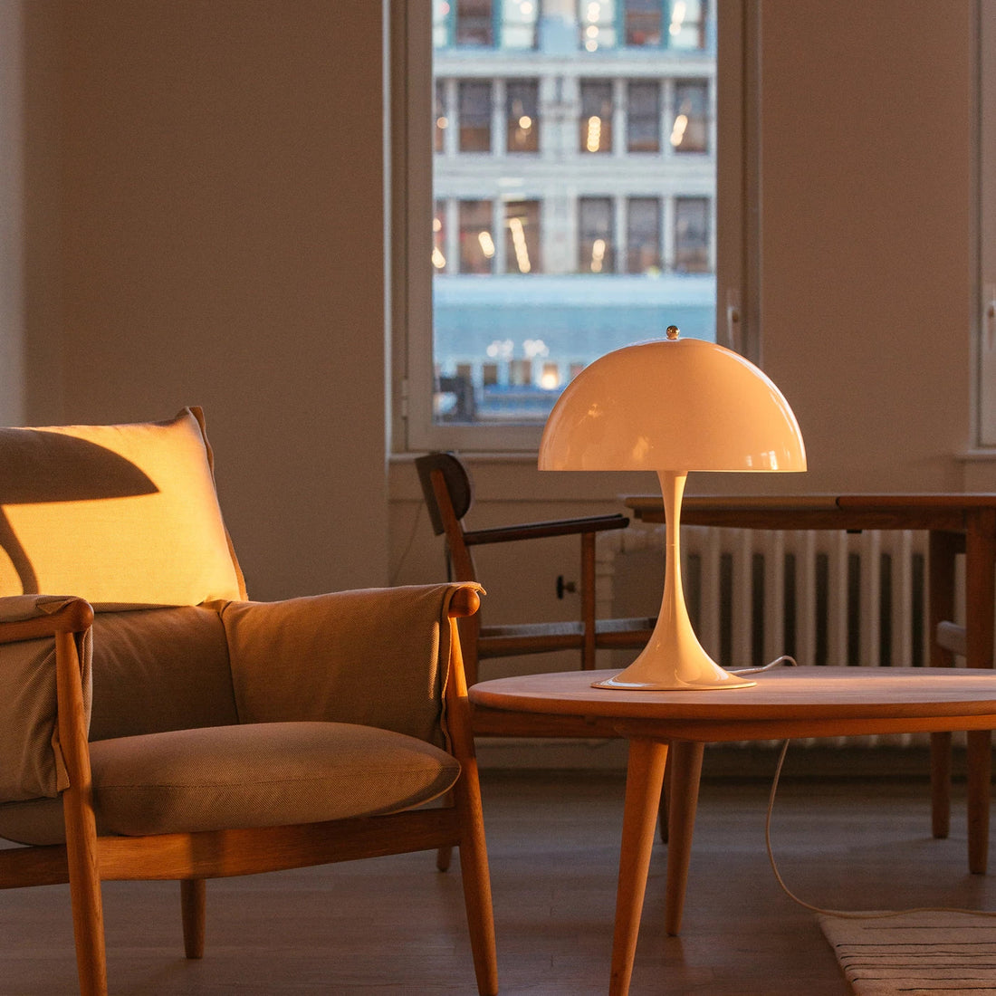 Panthella 400 Table Lamp by Louis Poulsen with iconic mushroom-shaped design and soft ambient glow, ideal for stylish modern interiors.