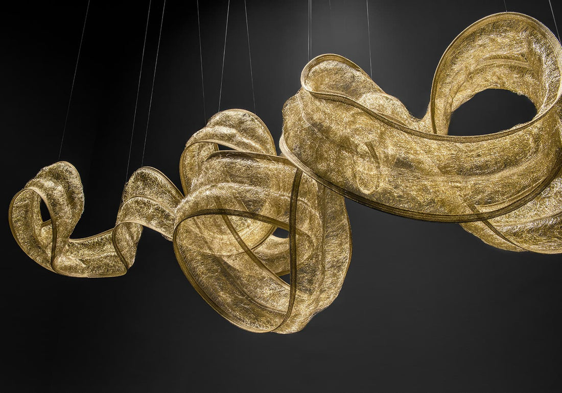 Genesis Suspension by Terzani with sculptural intertwined design, luxury Italian lighting in stainless steel and brass.