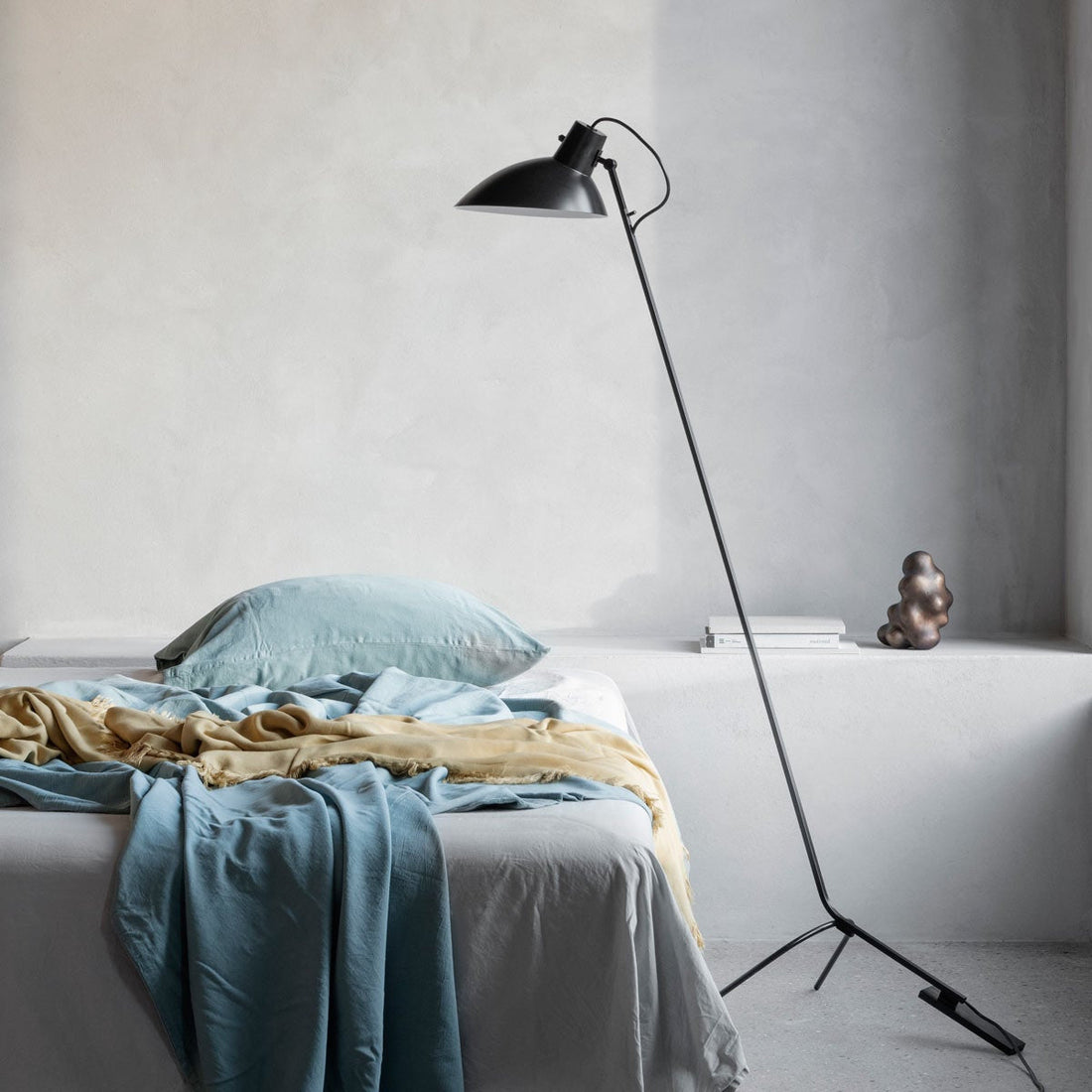 Astep Model 2050 Suspension Lamp featuring a lightweight disc-shaped diffuser in opaline glass, suspended by sleek brass rods for a modern, airy look.