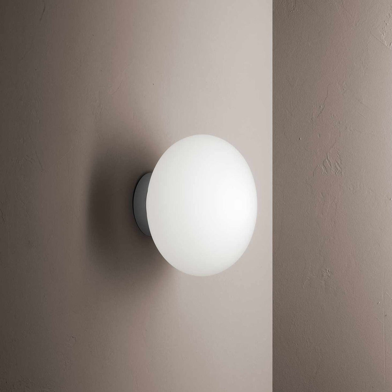 white glass round wall light