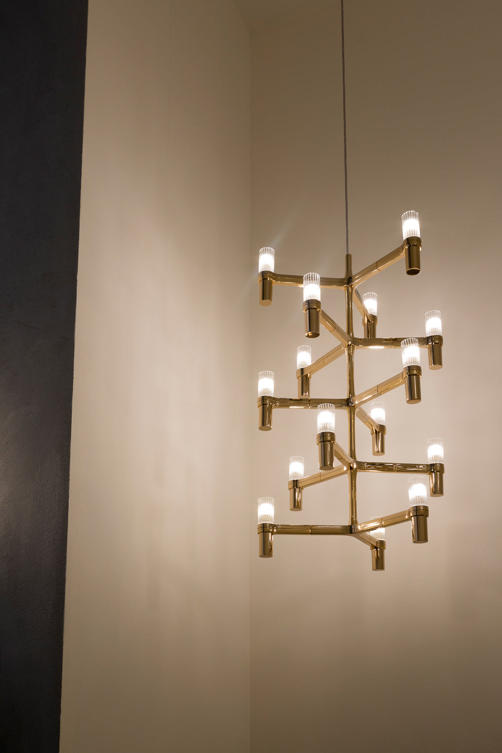 Gold Vertical Linear pendant for Staircase Italian. grand light, contemporary lighting, nemo lighting, luxury lighting
