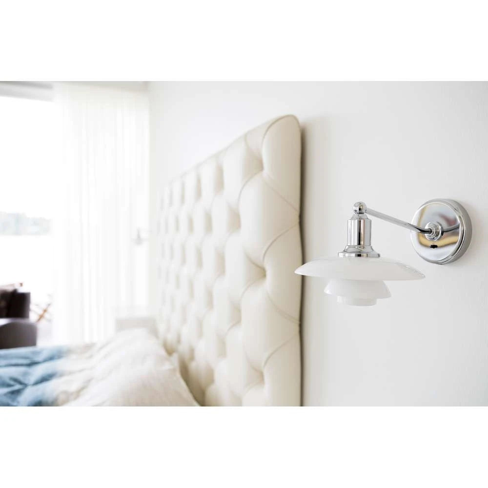 White & chrome wall light by Louis Poulsen  in India