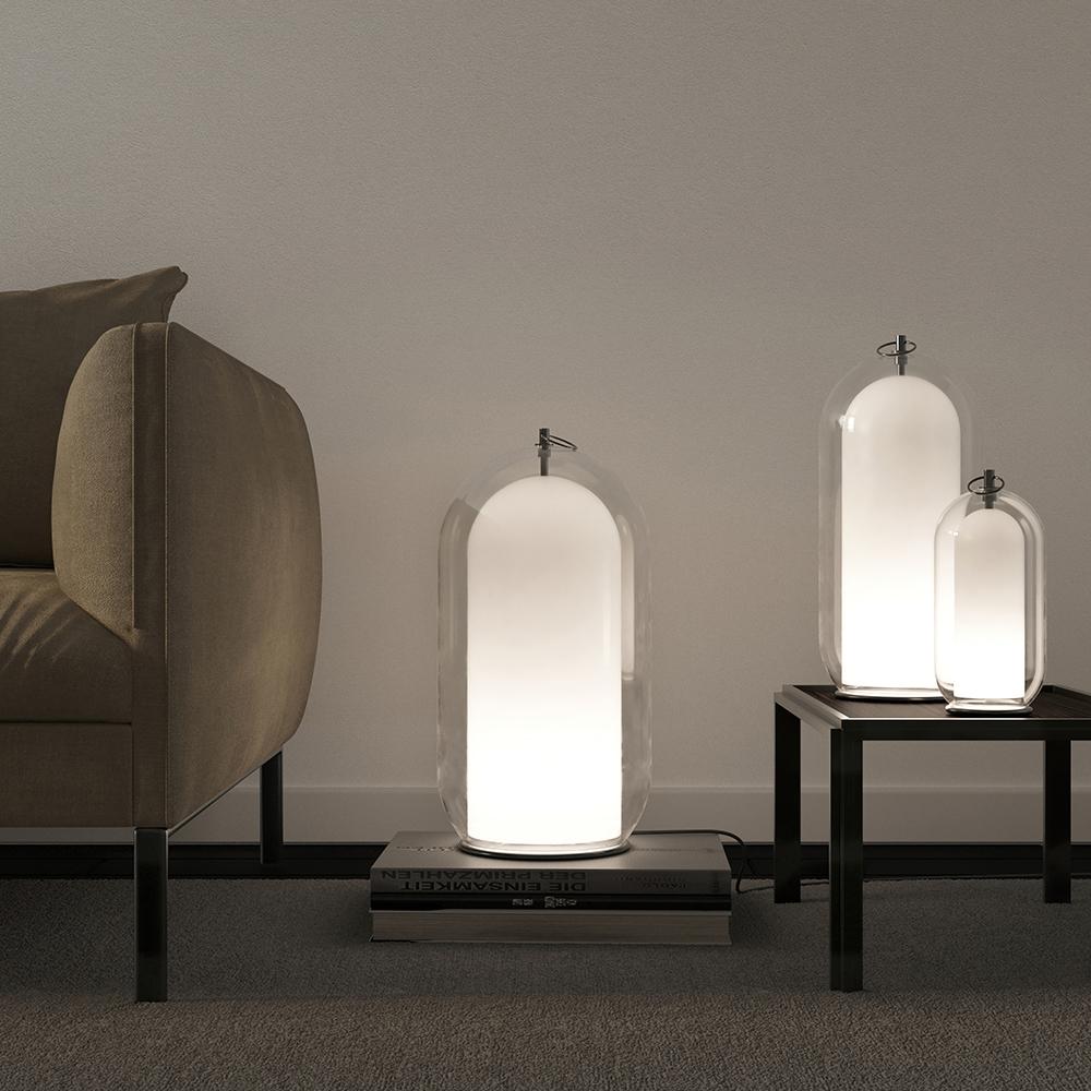 AERON© lamp showcasing handcrafted Italian glasswork on a contemporary base.