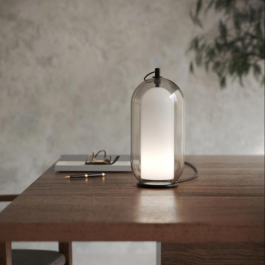 AERON© lamp showcasing handcrafted Italian glasswork on a contemporary base.
