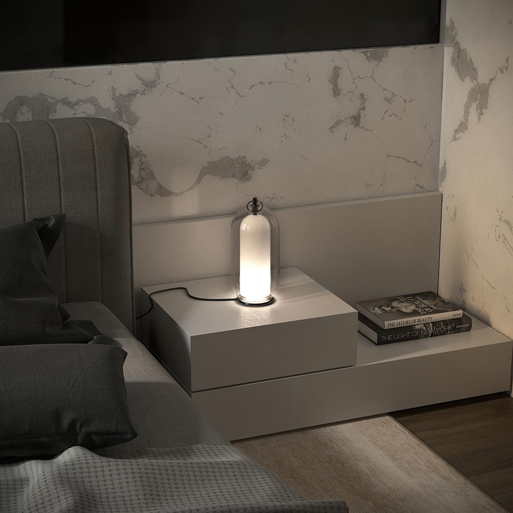 AERON© lamp showcasing handcrafted Italian glasswork on a contemporary base.