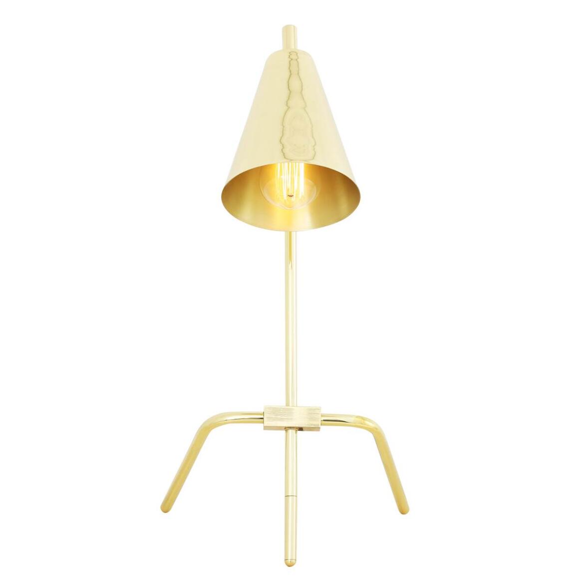 Gold table lamp with a cone-shaped shade on a white background