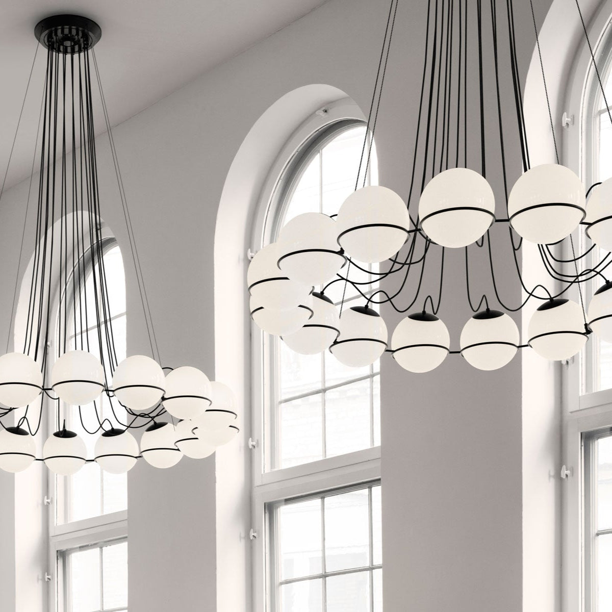 Astep Model 2109/12/14 Suspension Lamp with a lightweight structure and multiple opaline glass diffusers, offering sculptural elegance and soft illumination.