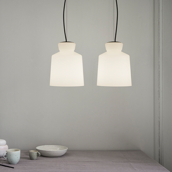 Astep SB Cinquantotto Suspension Lamp with a minimalist opaline glass sphere and sleek metal detailing, delivering soft, diffused ambient light.
