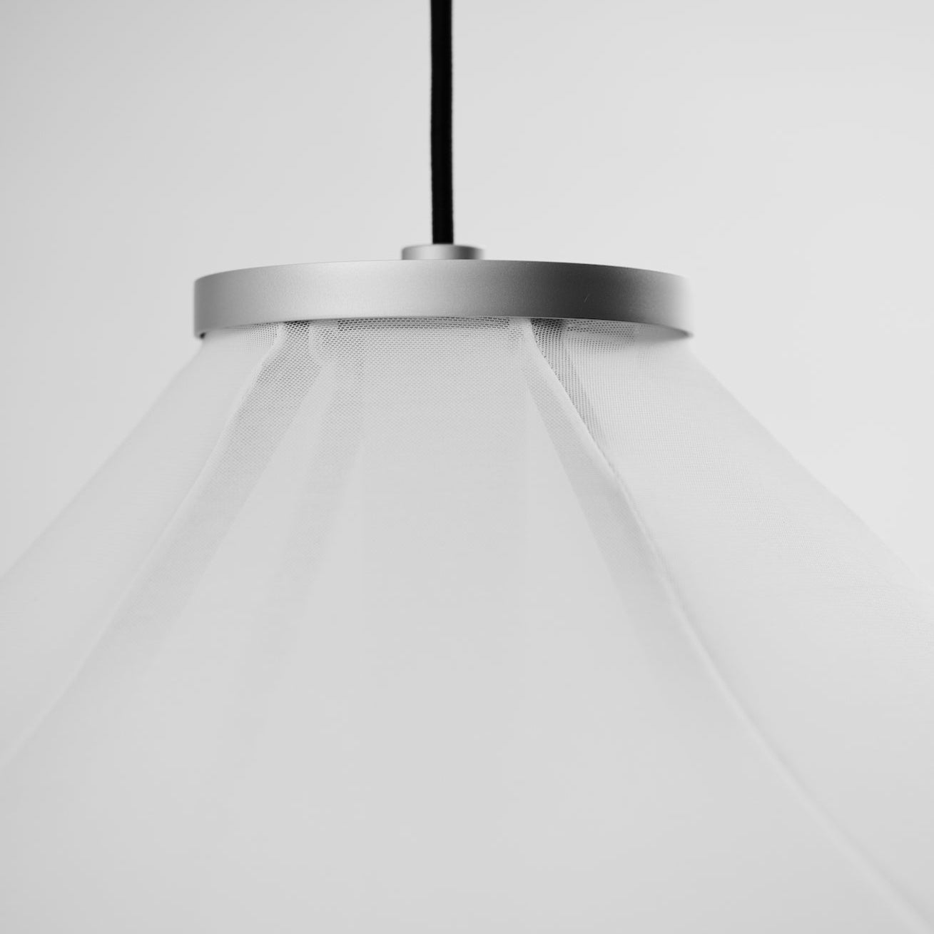 Astep Sopresa Suspension Lamp with layered circular shades in opaline glass and metal, creating soft, diffused light and contemporary elegance.