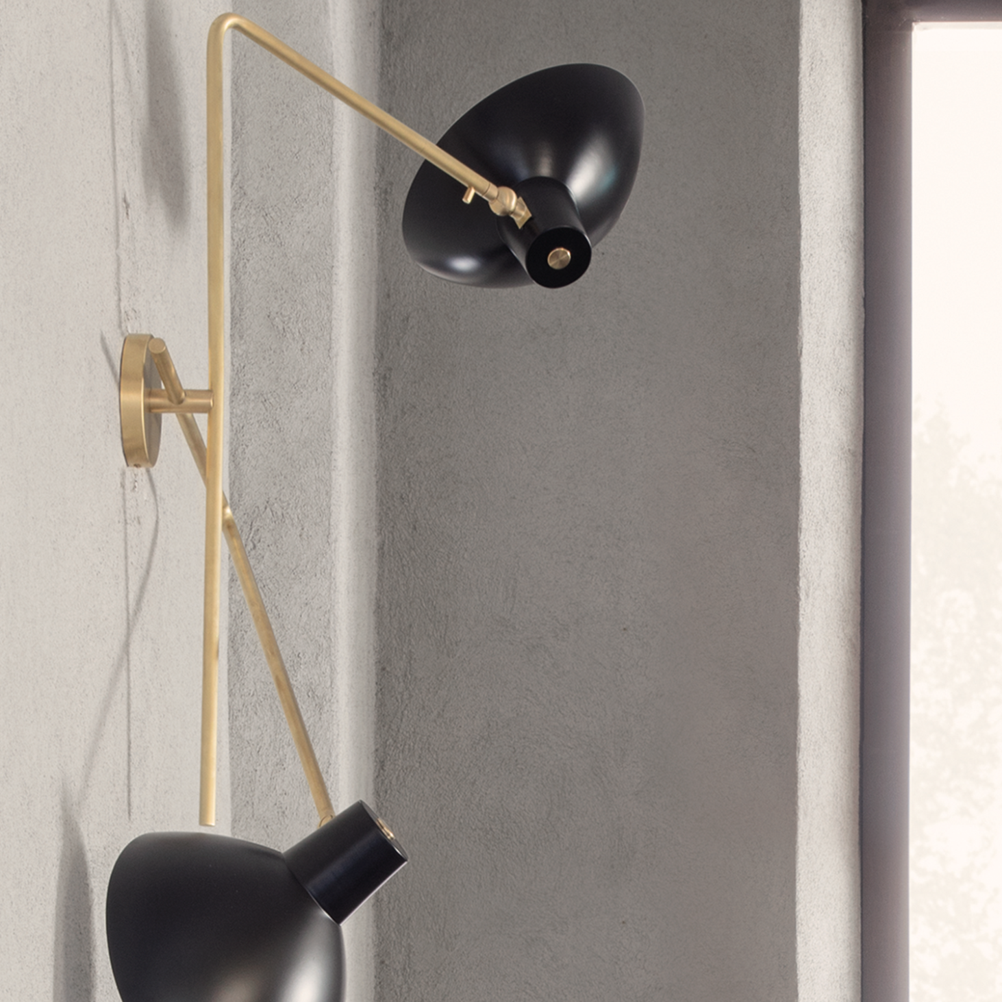 Astep VV Cinquanta Twin wall lamp with two adjustable spun aluminum reflectors on brass arms, combining mid-century elegance with functional lighting.