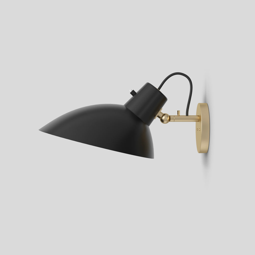 Astep VV Cinquanta Wall Lamp featuring a single adjustable aluminum reflector on a brass arm, showcasing elegant mid-century modern design.
