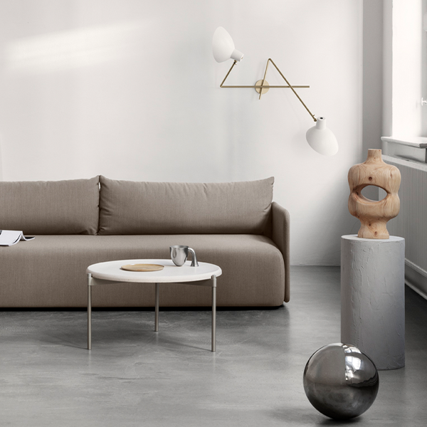 Astep VV Cinquanta Twin wall lamp with two adjustable spun aluminum reflectors on brass arms, combining mid-century elegance with functional lighting.