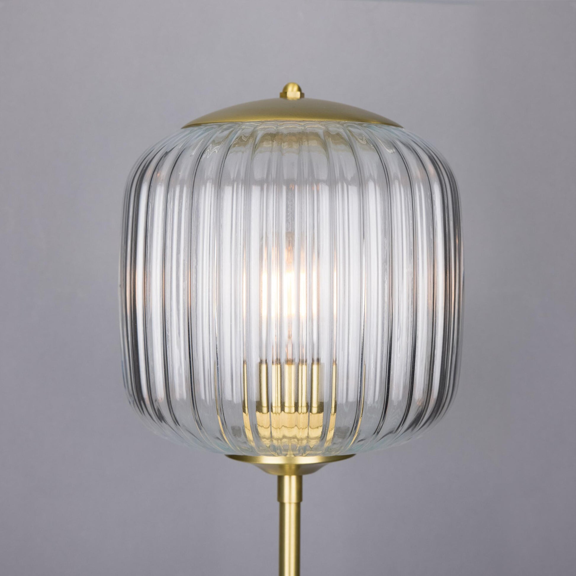 Astoria Reeded Table Lamp by Mullan Lighting – classic table lamp with reeded brass base and refined detailing, available at Angel Ventures, Mumbai.