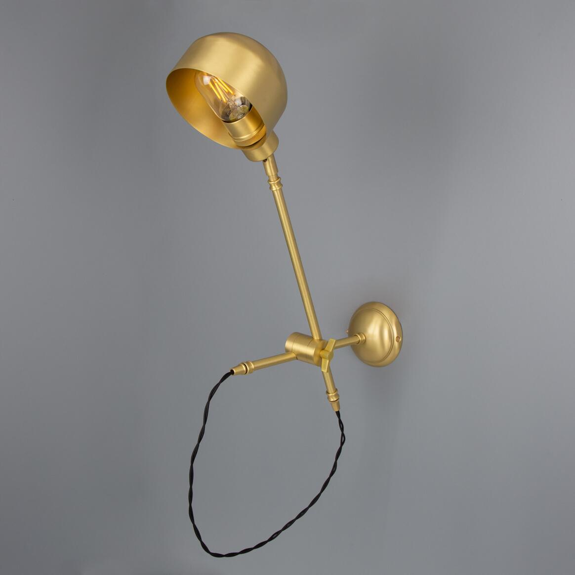 Bogota Swing Arm Wall Lamp by Mullan Lighting featuring an adjustable brass swing arm and elegant shade, perfect for versatile interior lighting