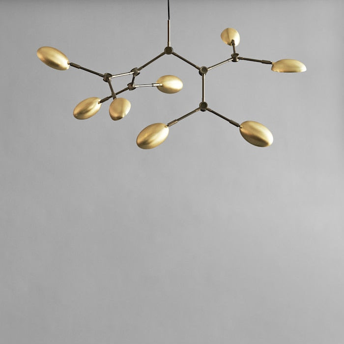 101 Copenhagen Drop Chandelier Mini in oxidized finish, showcasing 14 adjustable arms and sculptural shades, perfect for contemporary interiors.
