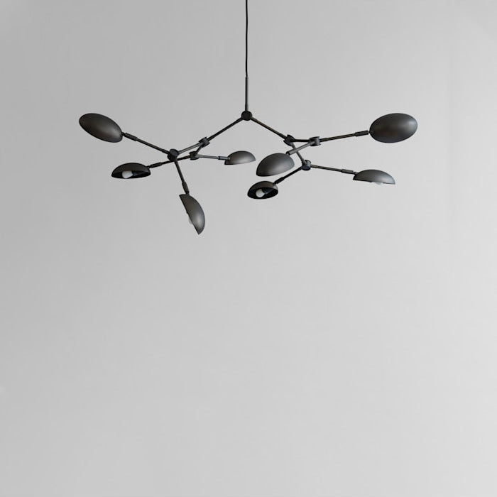101 Copenhagen Drop Chandelier Mini in oxidized finish, showcasing 14 adjustable arms and sculptural shades, perfect for contemporary interiors.
