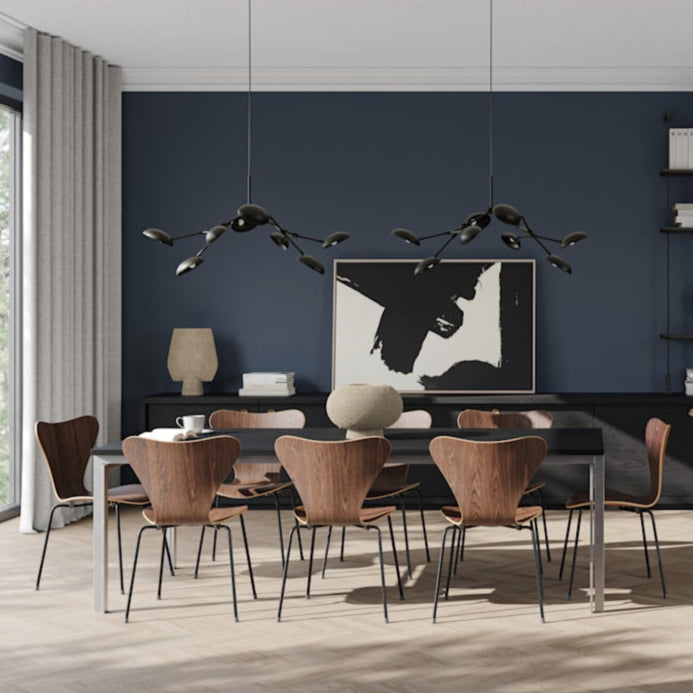 101 Copenhagen Drop Chandelier Mini in oxidized finish, showcasing 14 adjustable arms and sculptural shades, perfect for contemporary interiors.
