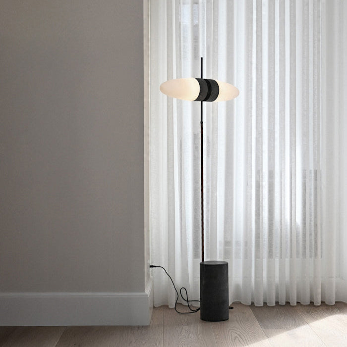 Bull Floor Lamp by 101 Copenhagen with its signature horn-shaped silhouette and twin opal glass shades standing tall in a contemporary interior.