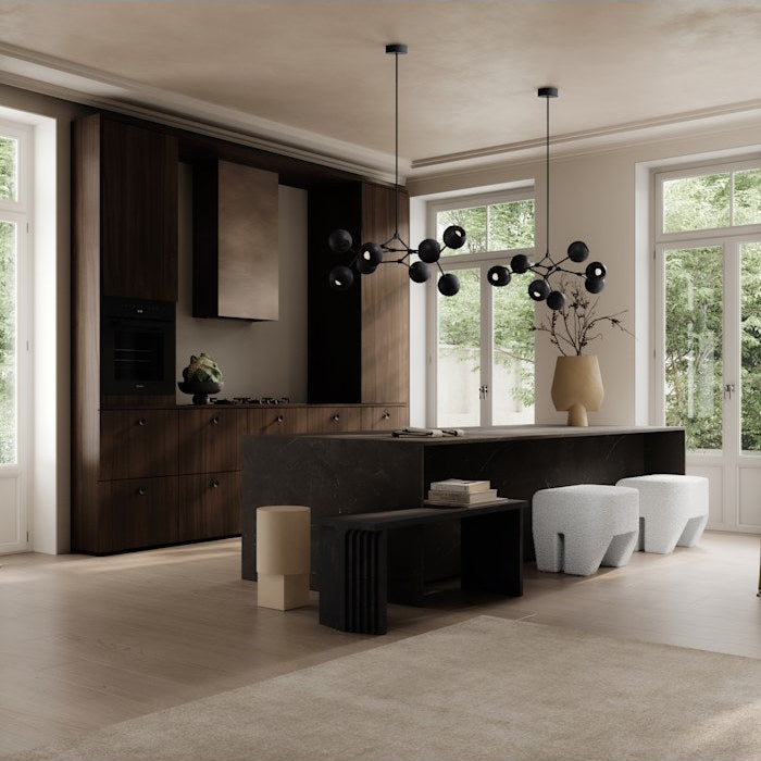 Drop Globe Chandelier Mini by 101 Copenhagen featuring sculptural globe shades and adjustable arms in a sleek, contemporary design.

