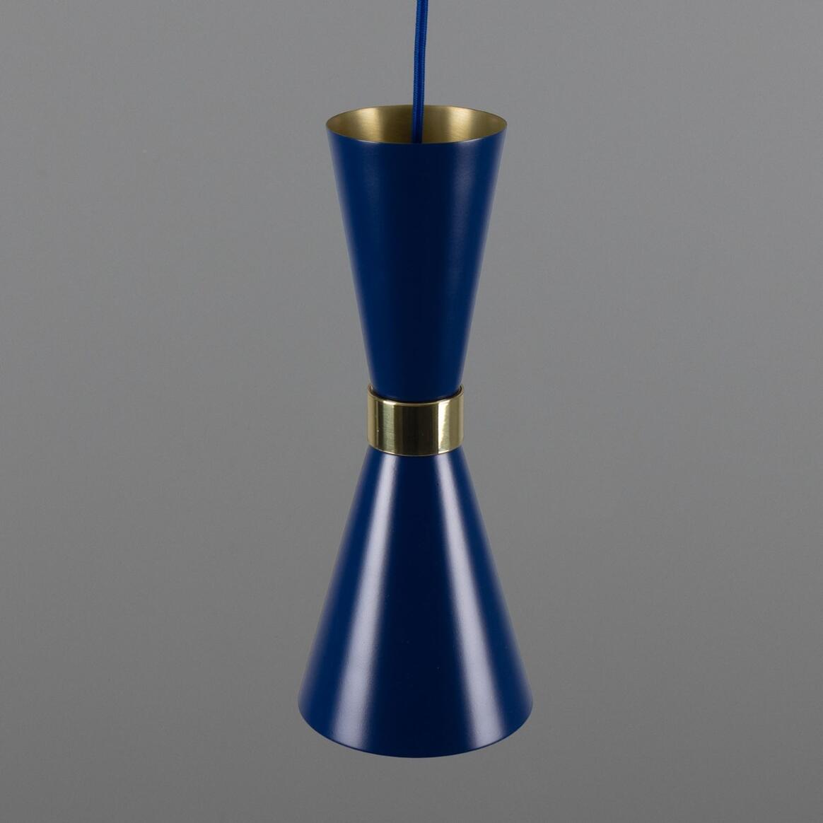 Blue and gold cylindrical object on a gray background