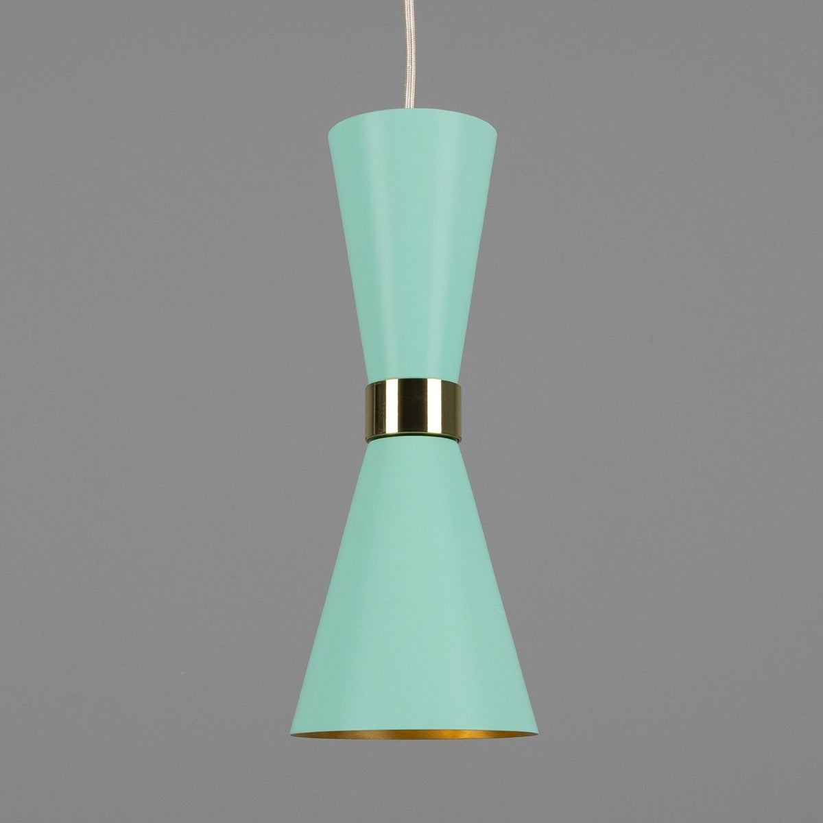 Turquoise pendant light with gold accent on a gray background