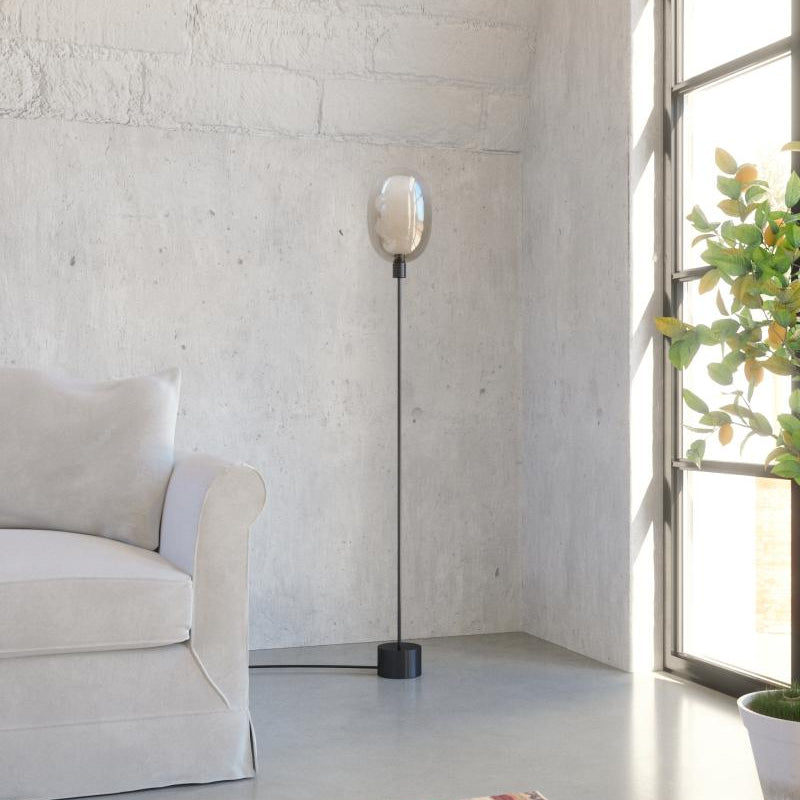 Modern decorative floor lamp—DALMA© by Cangini & Tucci with refined sculptural form.