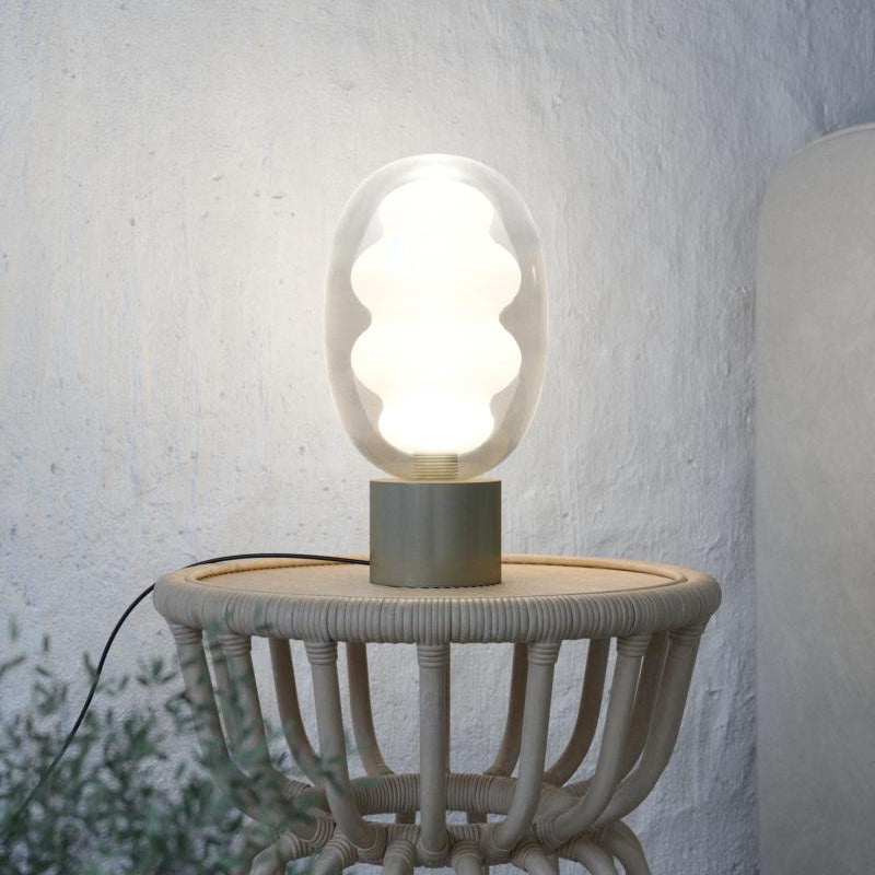 DALMA© lamp showcasing soft ambient light through handcrafted Italian glass.