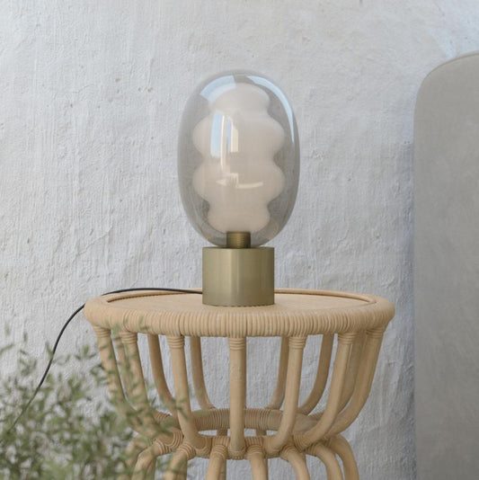 DALMA© lamp showcasing soft ambient light through handcrafted Italian glass.