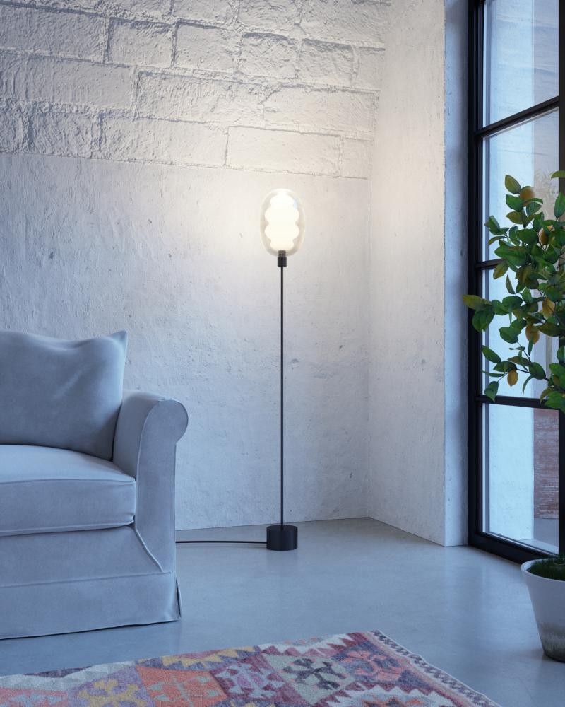 Modern decorative floor lamp—DALMA© by Cangini & Tucci with refined sculptural form.