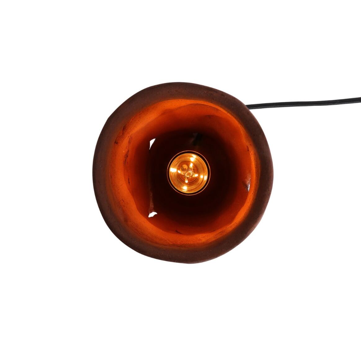 Round amber light bulb on a white background
