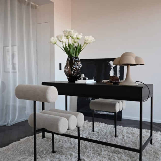 Fungus Table Lamp by 101 Copenhagen with a mushroom-inspired shape and smooth ceramic finish on a minimalist surface