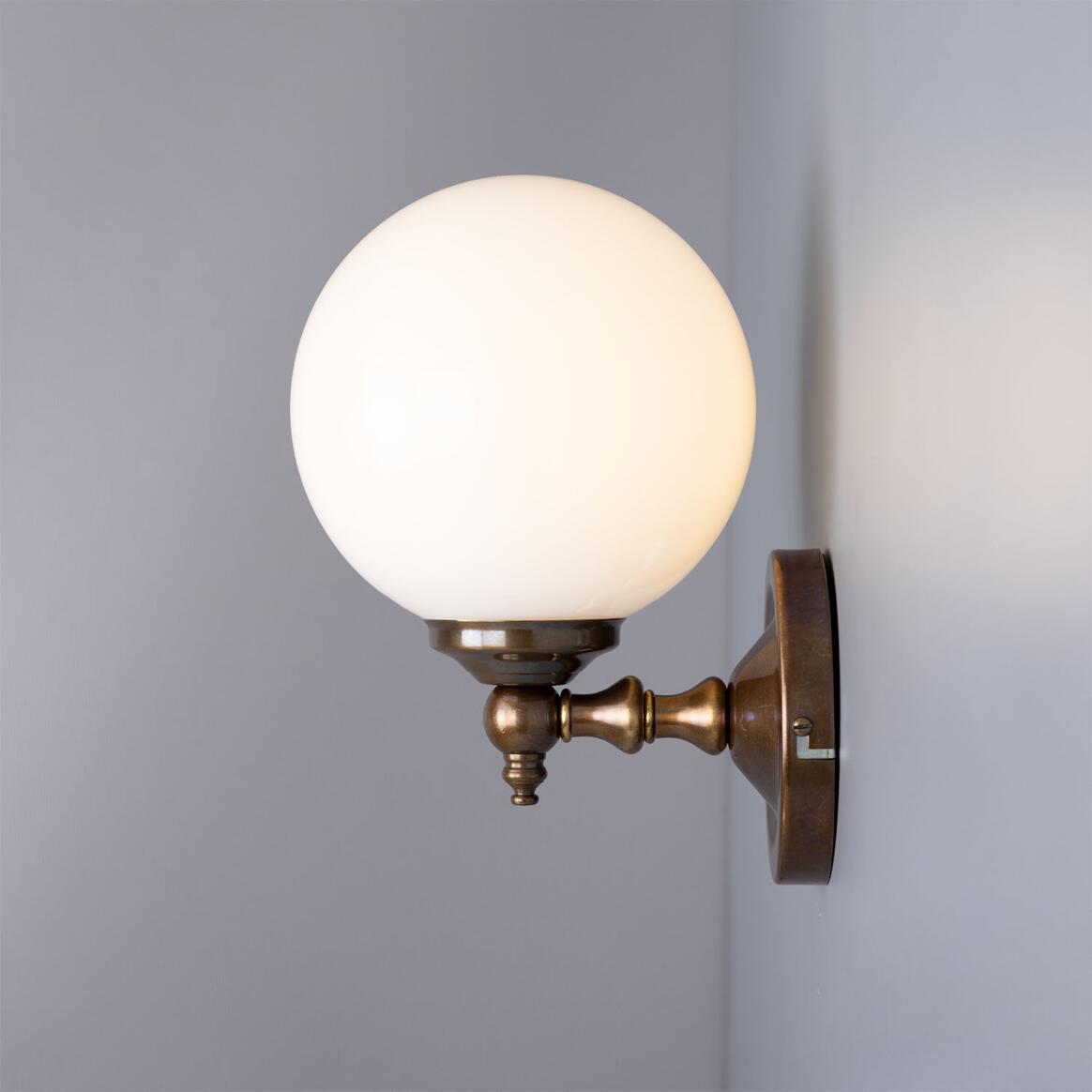 Cloghan Globe Wall Lamp by Mullan Lighting with a sleek globe-shaped shade and elegant wall mount for modern, ambient lighting