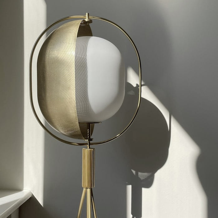 Pearl Floor Lamp by 101 Copenhagen with opal glass globes and a slender brass frame standing in a contemporary interior.