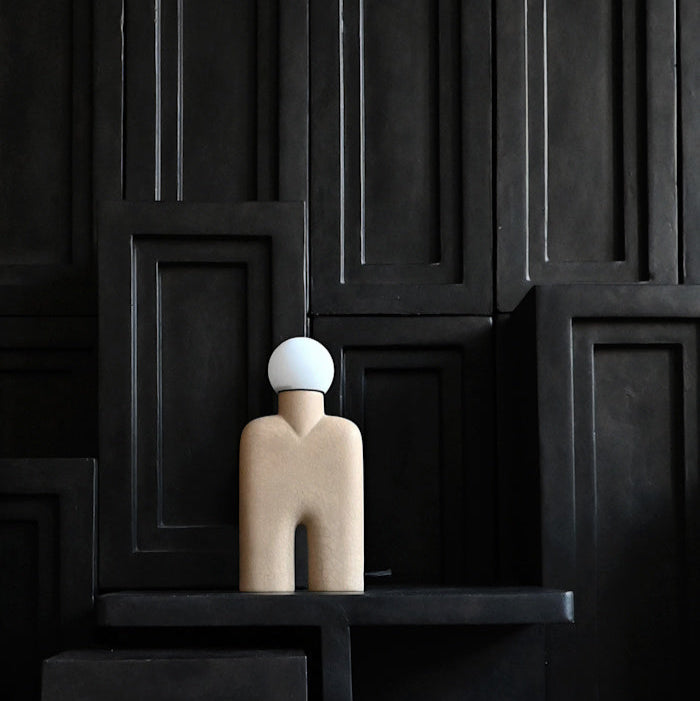 Cobra Table Lamp placed on a console table in a modern living space with neutral tones