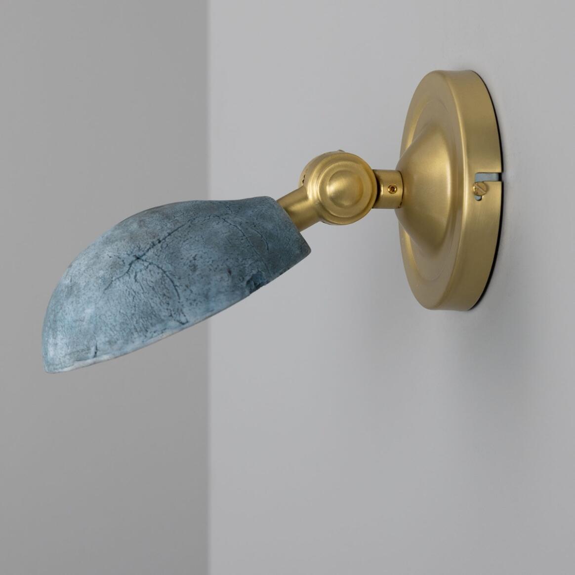 Coco Ceramic Wall Lamp by Mullan Lighting featuring a handcrafted ceramic shade with elegant, modern styling for warm, ambient illumination