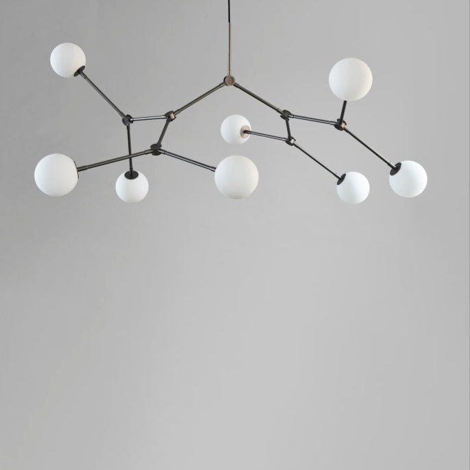 Drop Chandelier Bulb by 101 Copenhagen featuring multiple adjustable arms and exposed bulbs in a minimalist, sculptural design for modern living spaces.






