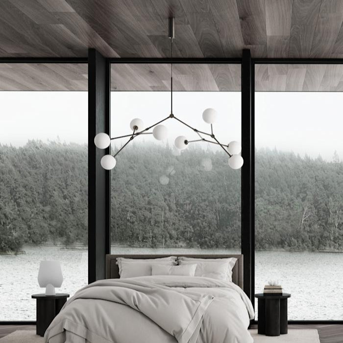 Drop Chandelier Bulb by 101 Copenhagen featuring multiple adjustable arms and exposed bulbs in a minimalist, sculptural design for modern living spaces.






